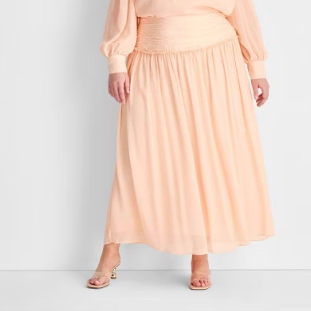 Pink Ruched  Maxi Skirt by future collection. This is fitting for a beach